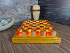 Luminous Inferno - Illuminated Teak & Resin Chess Set with Lava-Inspired Elements